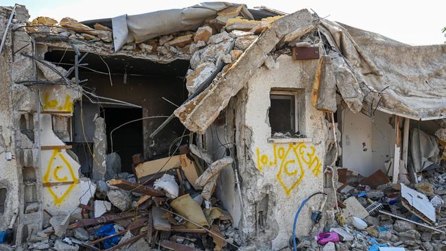 A house left in ruins after an attack by Hamas militants on a kibbutz, in which dozens of civilians were killed, on October 7, 2023. Picture: Alexi J. Rosenfeld/Getty Images