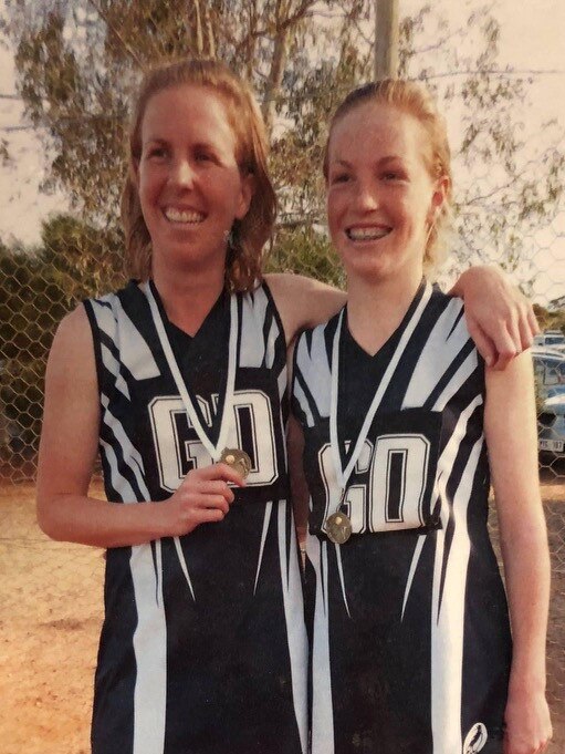 Hannah Petty and mum Karen on the netball court. Picture: Supplied