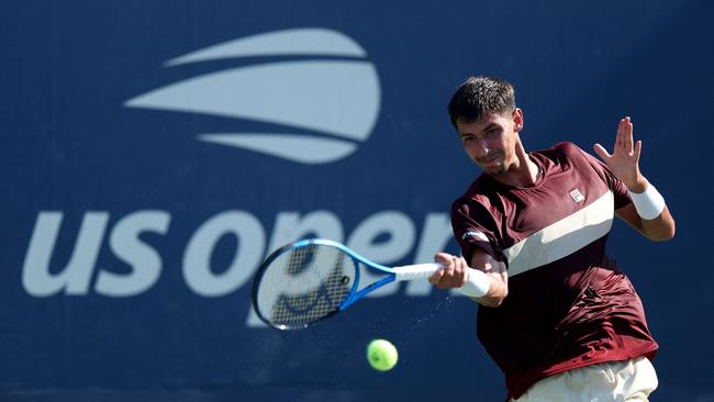 NEW YORK, NEW YORK - AUGUST 28: Alexei Popyrin of Australia returns a shot against Pedro Martinez Portero of Spain during their Men's Singles Second Round match on Day Three of the 2024 US Open at USTA Billie Jean King National Tennis Center on August 28, 2024 in the Flushing neighbourhood of the Queens borough of New York City. Luke Hales/Getty Images/AFP (Photo by Luke Hales / GETTY IMAGES NORTH AMERICA / Getty Images via AFP)