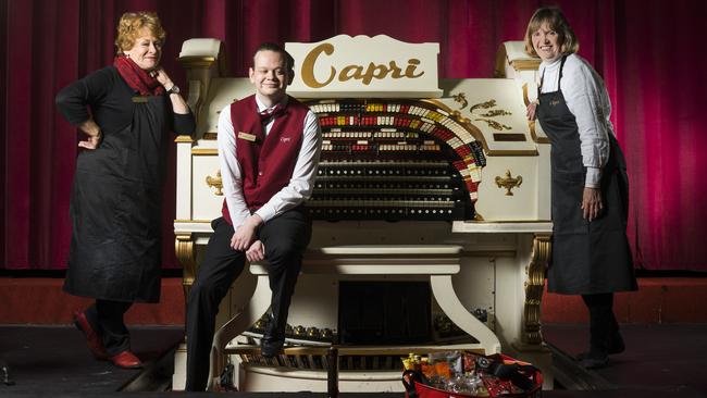 Capri Theatre volunteers Di Kiley, Jackson Hoult and Colleen Waterhouse with the Wurlitzer organ, helping the Capri Theatre celebrate its 75th year. Picture: Nick Clayton