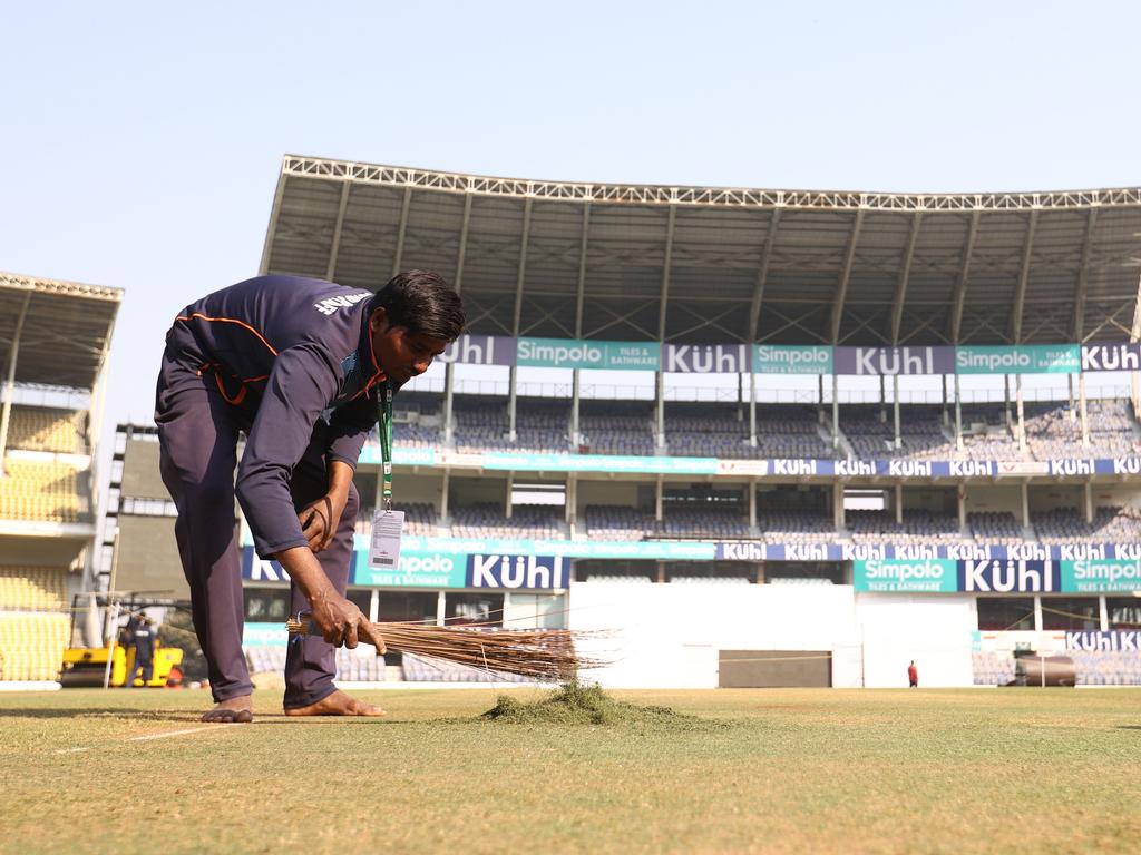 Ground keepers work on the pitch during a training session. Picture: Robert Cianflone/Getty Images