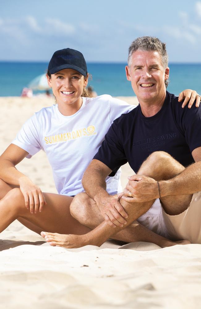 Surf Life Saving champion Jordan Mercer with dad and legend of the sport Darren Mercer on Noosa Main Beach. Photo Lachie Millard