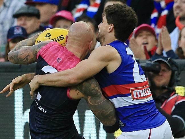 Tom Liberatore tackles Nathan Jones in Round 8. Picture: Wayne Ludbey