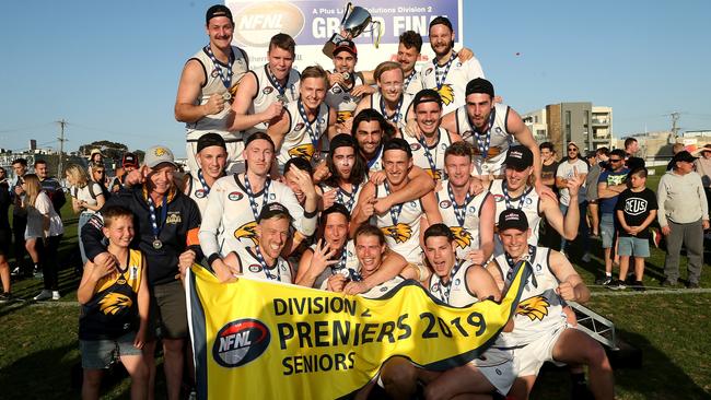 Whittlesea players celebrate their NFL Division 2 premiership. Picture: Hamish Blair