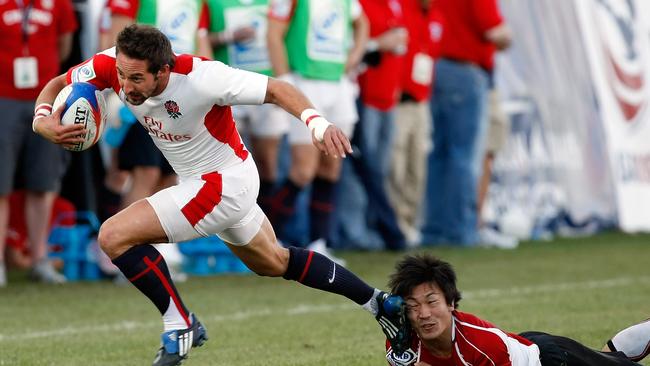 LAS VEGAS - FEBRUARY 13: Ben Gollings #10 of England gets away from Hiraku Tomoigawa #6 of Japan during the IRB Sevens World Series at Sam Boyd Stadium February 13, 2010 in Las Vegas, Nevada. England won the match 24-5. (Photo by Ethan Miller/Getty Images)