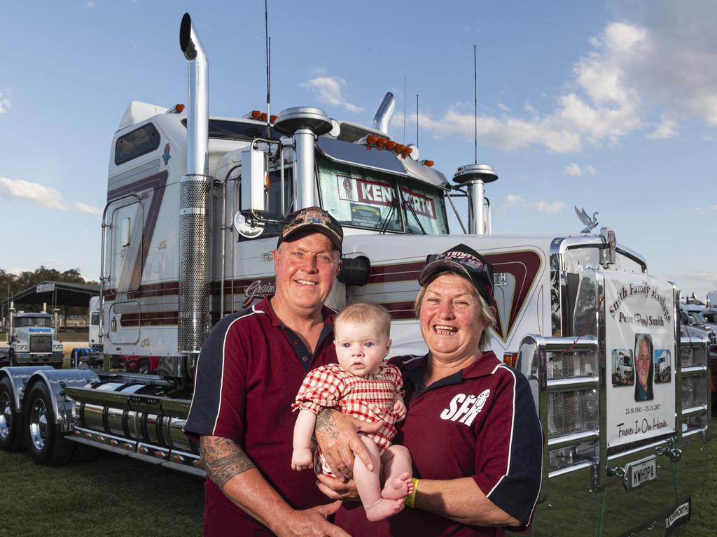 Baby Zari Johanson with her truck driving grandparents Lucy and Jason Smith at Lights on the Hill Trucking Memorial at Gatton Showgrounds, Saturday, October 5, 2024. Picture: Kevin Farmer