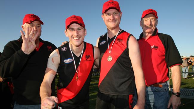 The 2007 SFL Morphett Vale premiers (L-R) Reg Pollard, Scott Pollard, Martin Short and Terry Short. Picture: Stephen Laffer