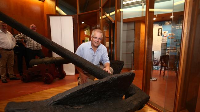 Prime Minister Scott Morrison with the recovered anchor from Captain Cook's Endeavour in the James Cook Museum in Cooktown. Picture: Brendan Radke