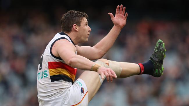 Josh Jenkins kicks for goal for the Crows during the Round 19 match against Carlton. Picture: AAP Image/David Crosling