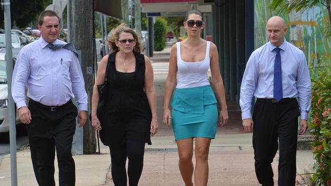 Shandee’s mother Vicki, sister Shannah with Senior Sergeant Anthony Cowan, right. Picture: Peter Holt / Daily Mercury