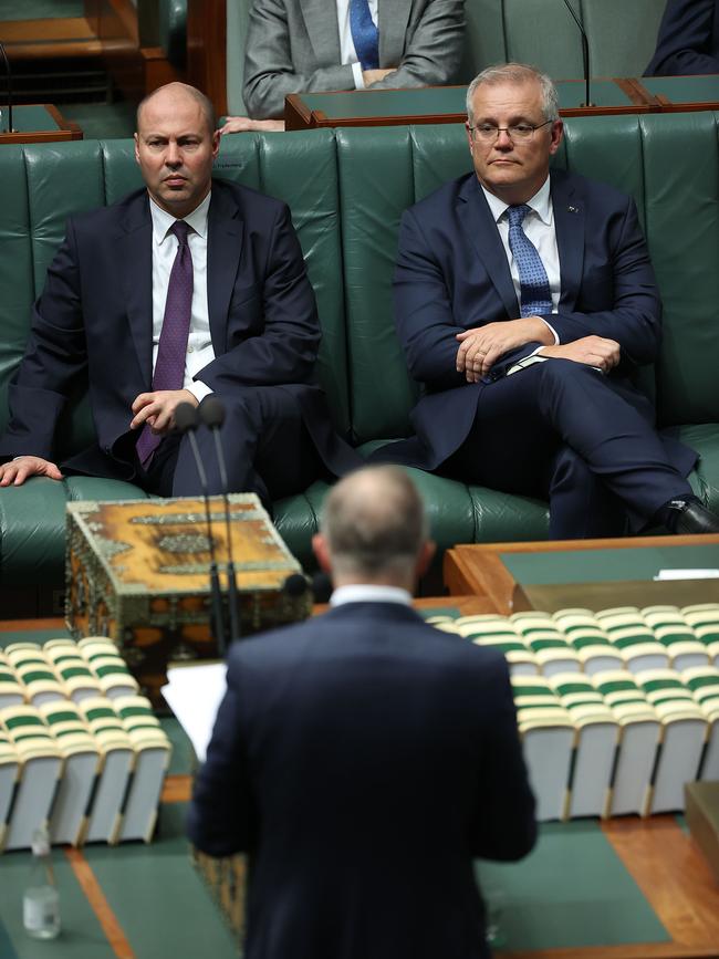 Treasurer Josh Frydenberg and Prime Minister Scott Morrison listen to Labor Leader Anthony Albanese as he delivers his Budget Reply Speech. Picture: NCA NewsWire / Gary Ramage