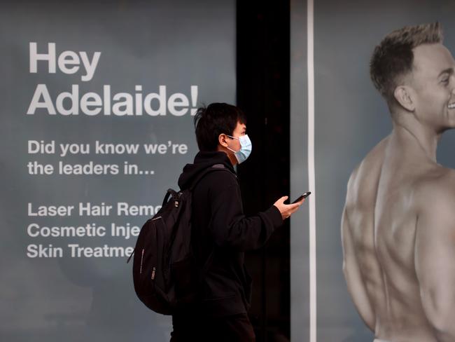 ADELAIDE, AUSTRALIA - NewsWire Photos August 13: People wearing masks in Adelaide. Picture: NCA NewsWire / Kelly Barnes