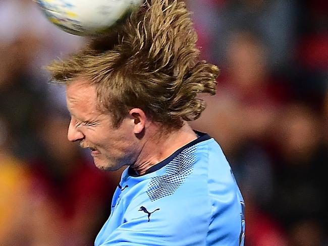 ADELAIDE, AUSTRALIA - OCTOBER 30: Ryhan Grant of Sydney FC heads over Craig Goodwin of Adelaide United  during the FFA Cup Final match between Adelaide United and Sydney FC at Coopers Stadium on October 30, 2018 in Adelaide, Australia.  (Photo by Mark Brake/Getty Images)