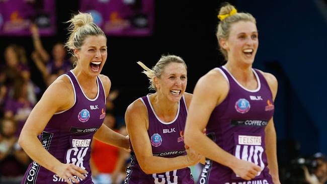 Laura Geitz, left, after the Firebirds win in the trans-Tasman league.