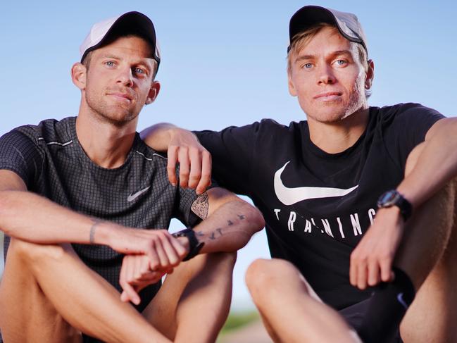 Olympic bound athletes and best mates Stewart McSweyn and Brett Robinson pose after a training session in Melbourne, Tuesday, March 17, 2020. (AAP Image/Michael Dodge) NO ARCHIVING