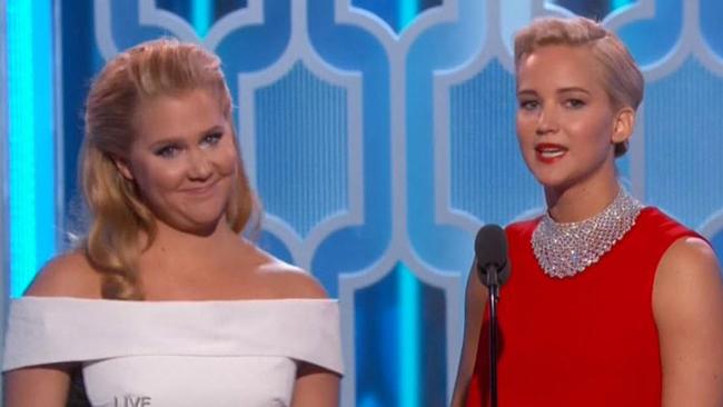 Amy Schumer pushes the boundaries on stage with Jennifer Lawrence.