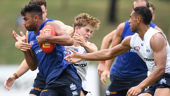 Tarryn Thomas tries to burst through a pack. Picture: Getty Images