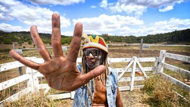 Robert Corowa protests at the site of the North Lismore Plateau development.