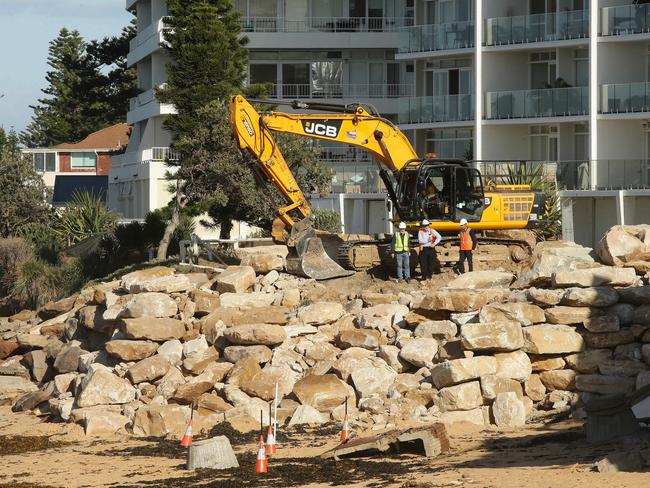 A ramp was built on the beach near the damaged houses in Collaroy. Picture: Braden Fastier.