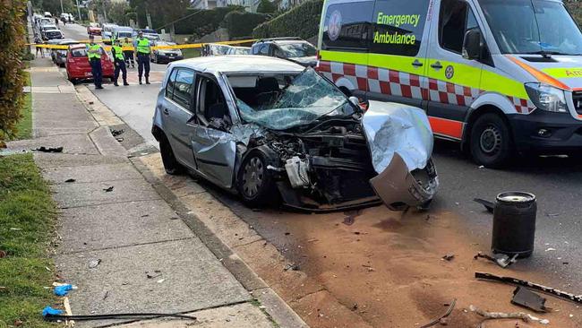 Numerous cars were badly damaged and two people hurt when a tipper truck lost control and jackknifed on Alexander St, Collaroy in August 2019. Picture: CareFlight