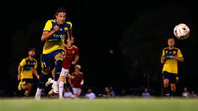 Gold Coast United's Zahi Addis chases down a loose ball. Picture: Connor Bowness/Football Queensland