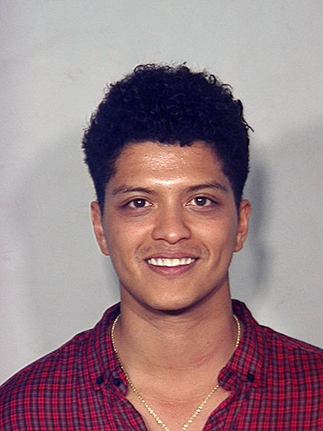 Peter Hernandez, a Hip-Hop performer whose stage name is “Bruno Mars” poses for a mug shot photo after he was arrested at the Clark County Detention Center September 19, 2010 in Las Vegas, Nevada. Hernandez was charged with possession of a controlled substance after officers found him with 2.6 grams of cocaine at the Hard Rock, Las Vegas. (Photo by Las Vegas Metropolitan Police Department via Getty Images)