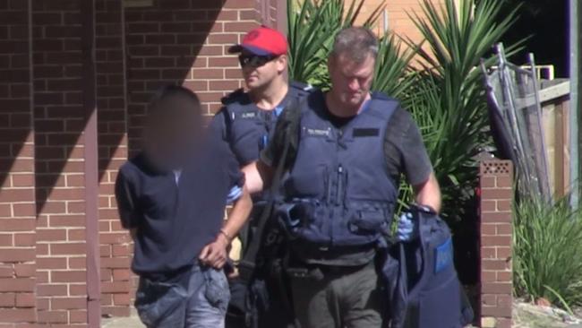 Two men and a woman were arrested and charged after raids in Flemington. Picture: Victoria Police.