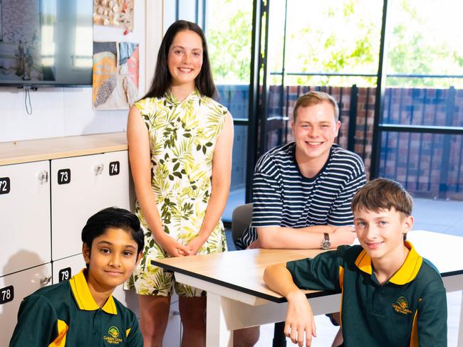 Golden Grove High School current year 7 students Vivaan Pande, 12 and Zac Kenny, 12 (front) with 2022 Graduates Alana Wilkinson, 17, and Sam Bate, 18, at the school on January 27, 2023. The Advertiser/ Morgan Sette