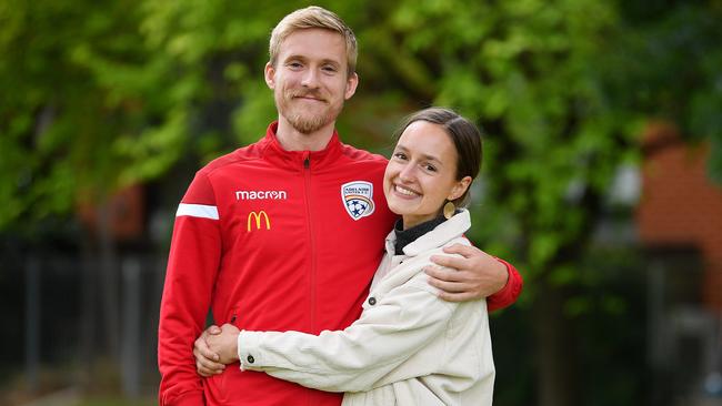 EMBARGOED UNTIL 2PM WEDNESDAY, MARCH 4: -Adelaide United's Ben Halloran with his partner Helen van Laak at Linde Reserve at Stepney after Ben re-signed for two years with Adelaide United Tuesday March 3,2020.Picture Mark Brake