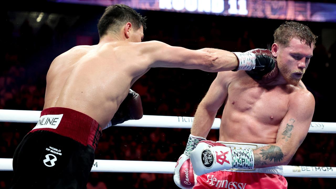 Dmitry Bivol lands a right on Canelo Alvarez during their WBA light heavyweight title fight. (Photo by Al Bello/Getty Images)