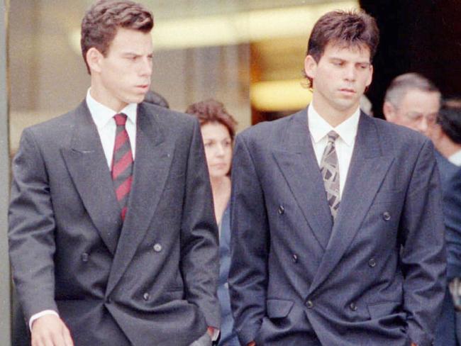 Erik (L) and Lyle Menendez leave the memorial service for their slain parents in Los Angeles. 08/89. Mene/fam