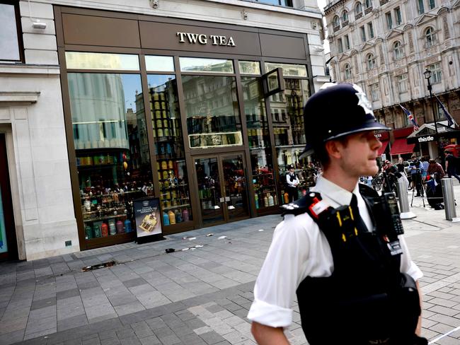 Police outside the tea shop after the stabbing. Picture: AFP