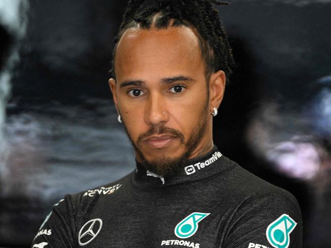 Mercedes' British driver Lewis Hamilton looks on in the stand during the first practice session at the Circuit de Catalunya on June 21, 2024 in Montmelo, on the outskirts of Barcelona, ahead of the Spanish Formula One Grand Prix. (Photo by Josep LAGO / AFP)