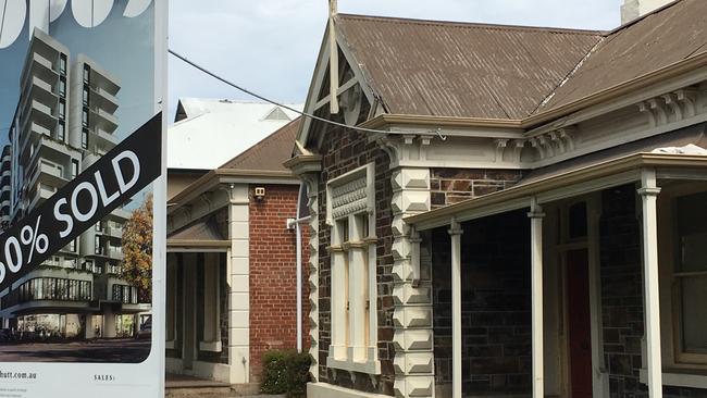 The pair of 1880s bluestone cottages on Hutt St that were demolished for an apartment complex, but could now be replaced with a car park. Picture: Sandy Wilkinson