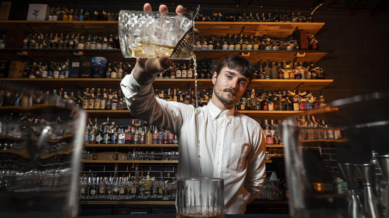 Death and Taxes manager, Kieran Reekie, making an Old Fashioned. Picture: Matthew Poon