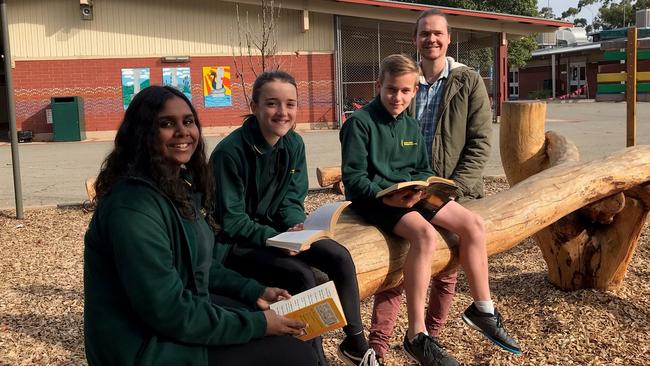 Ascot Park Primary School deputy principal Sam Kennedy with students Tasharah, Charlotte and Lachlan. Picture: Supplied