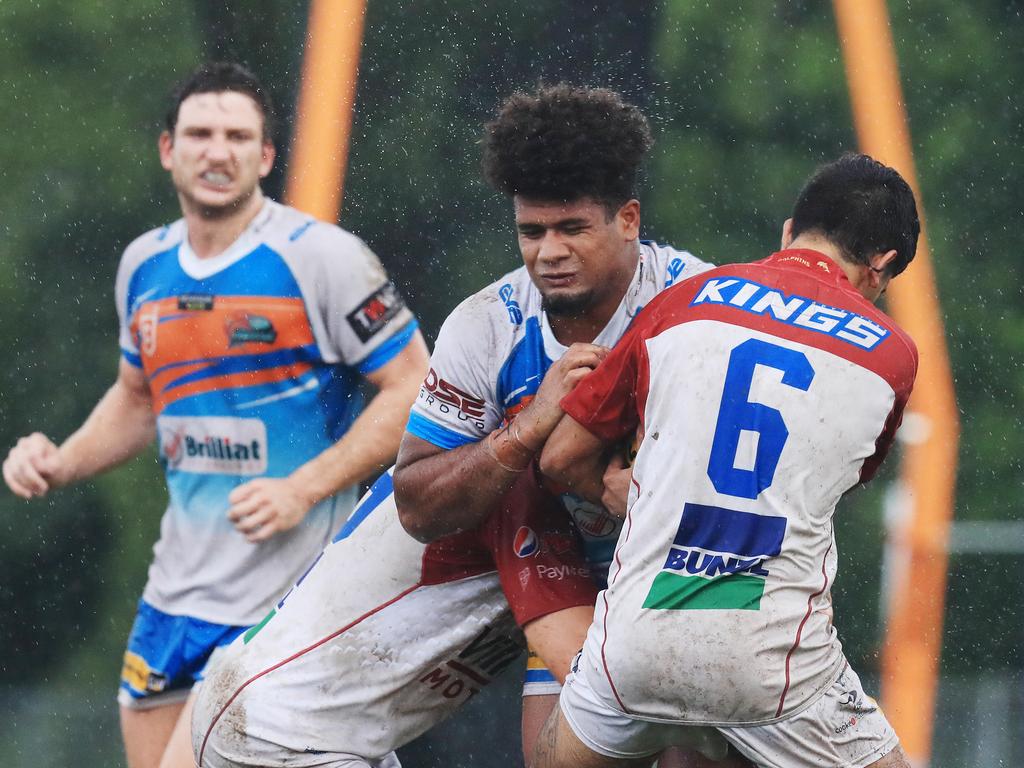 Sami Raivaroro is tackled in the Hastings Deering Colts Queensland Cup match between the Northern Pride and the Redcliffe Dolphins, held at Barlow Park. Picture: Brendan Radke