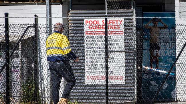 A SafeWork SA inspector at the scene where a young boy drowned on Saturday, December 4. Picture: Tom Huntley