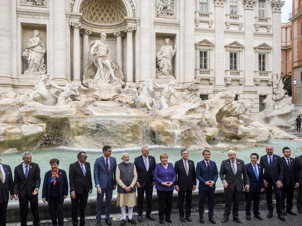 Scott Morrison (7th from left) stands next to German Chancellor Angela Merkel and leaders from the G20 in front of the Trevi fountain in Rome. Picture: Getty Images