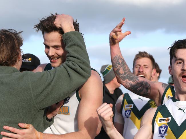 GFL preliminary finals Senior footy: Newtown &amp; Chilwell v Leopold. Leopold's Connor Giddings (left, no 18) kicked the winning goal after he siren and celebrates with the team. Picture: Mike Dugdale