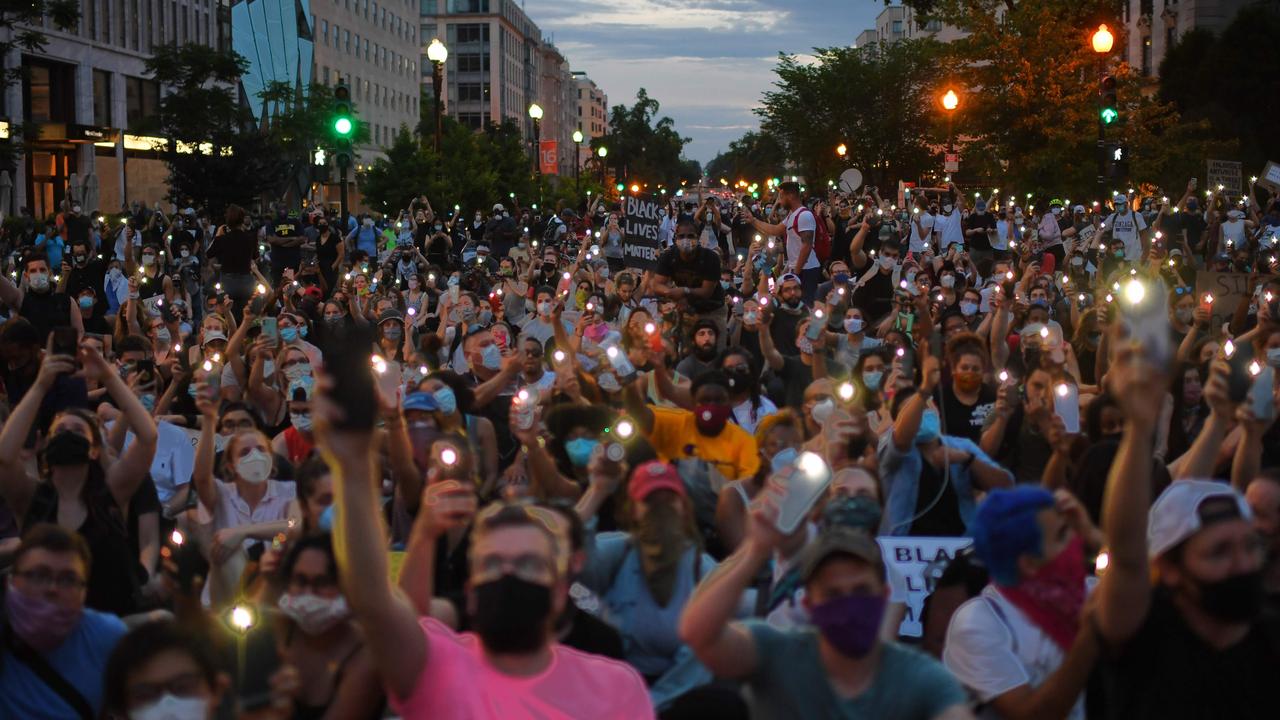 Thousands of the protesters outside the White House sang Bill Withers’ ‘Lean On Me’. Picture: Eric Baradat/AFP