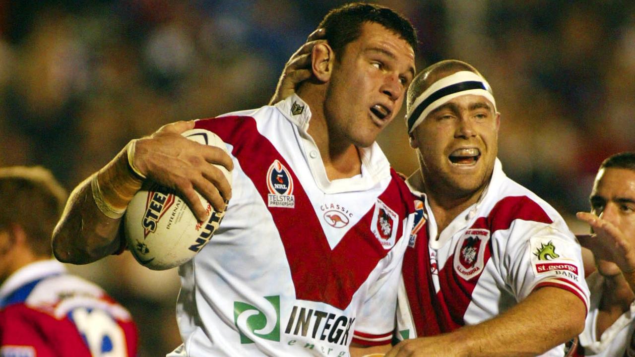 Newcastle August 2 2002. Jason Ryles congratulated by Shane Millard on scoring the opening try - NRL Newcastle Knights v St George Illawarra at EnergyAustralia Stadium. (AAP Image/Colin Whelan/Action Photographics) NO ARCHIVING EDITORIAL USE ONLY