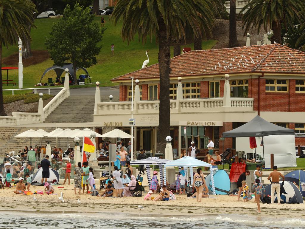 Beach goers cooling off on Boxing Day 2024 at Geelong's Waterfront. Picture: Alison Wynd