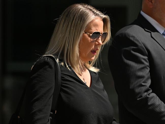 19/09/2022: Former Brisbane Grammar School teacher Angela Bronia Brown, 46, who allegedly attacked another female teacher and was  charged with grievous bodily harm, leaves the  Supreme Court after appearing today in Brisbane. pic Lyndon Mechielsen/Courier Mail