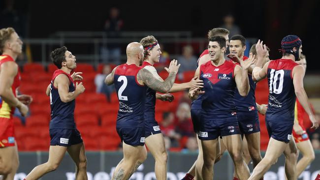 Christian Petracca and the Demons celebrate a goal. Pic: AAP