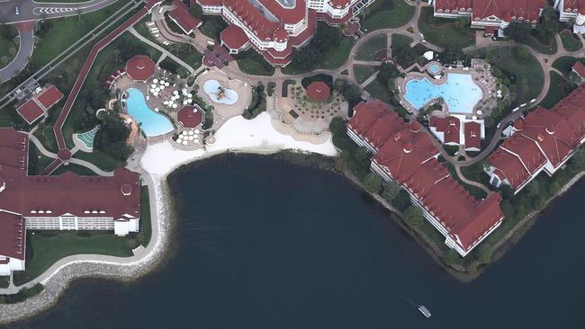 A search boat scours the waters off the beach at Walt Disney World’s Grand Floridian resort hotel. Picture: Joe Raedle/Getty Images/AFP