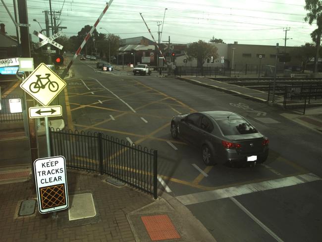 Over a thousand Adelaide drivers caught running red lights at rail ...