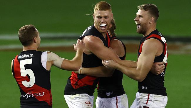 Peter Wright of the Bombers celebrates goal number 7. Picture: Michael Klein