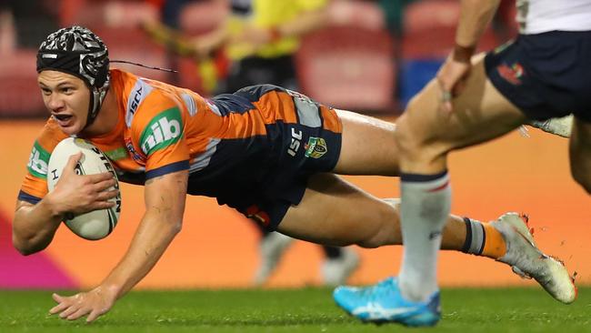 Kalyn Ponga scoring a try for the Knights.  (Photo by Tony Feder/Getty Images)