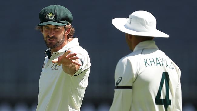 Joe Burns talks with Usman Khawaja during day two of the match between Australia A and Pakistan. Picture: Paul Kane/Getty Images